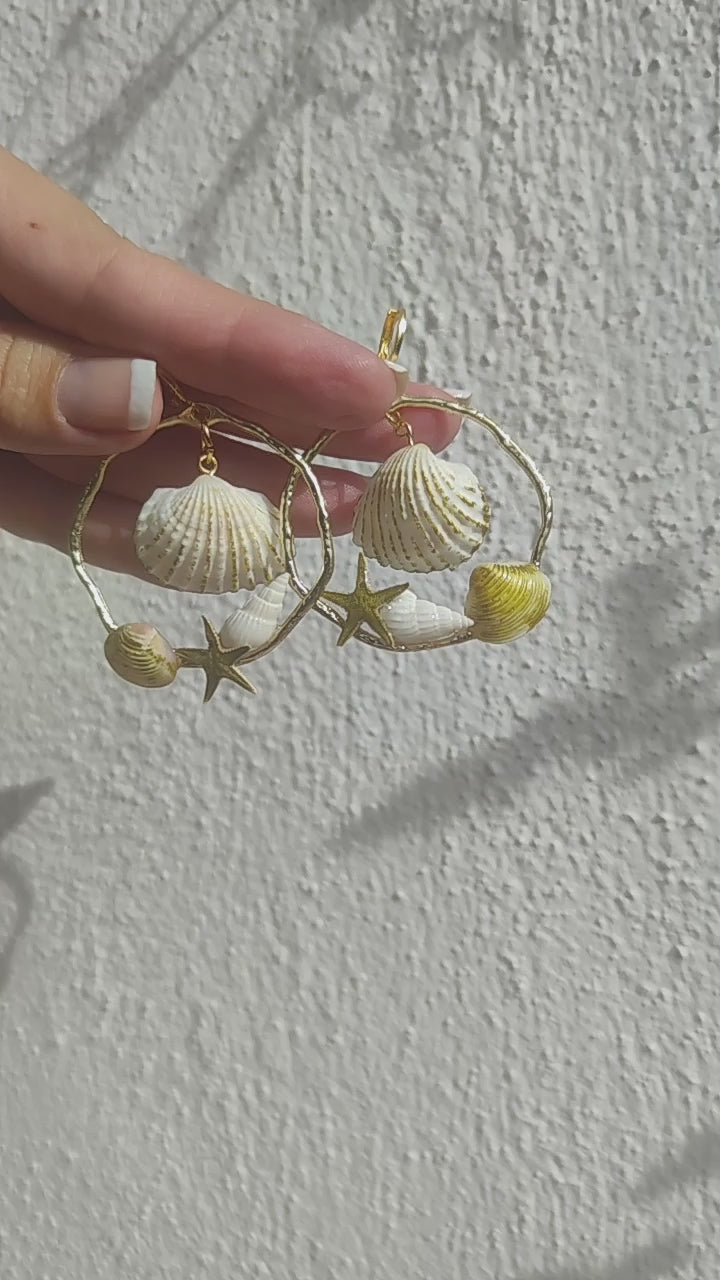 Pendientes de conchas naturales hechos a mano