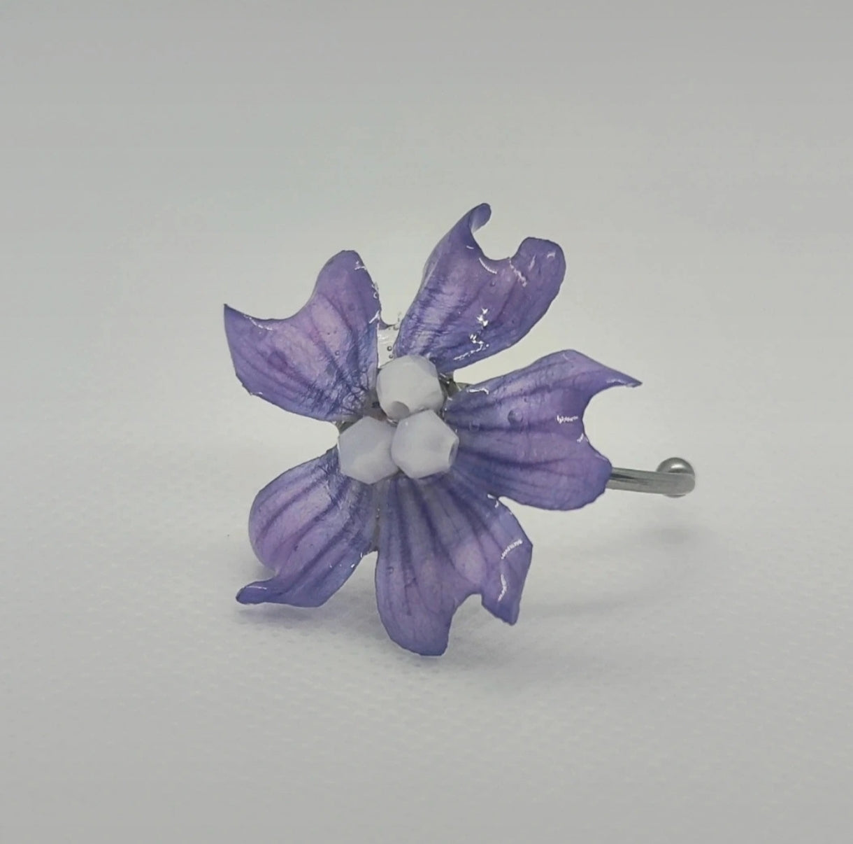 Anillo de malva real resinada