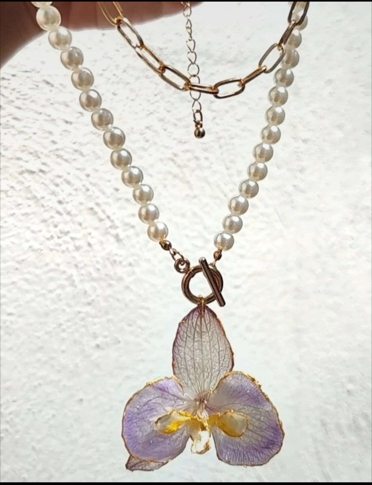 Collar doble de orquídea real